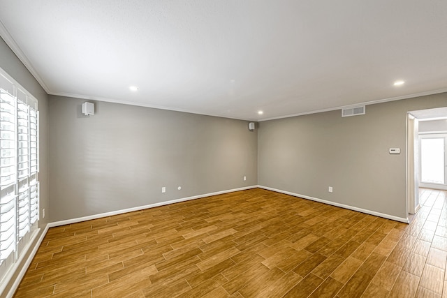 1329 Fountain View Dr Unit 135, Houston, TX 77057 - spare room with hardwood / wood-style flooring and ornamental molding