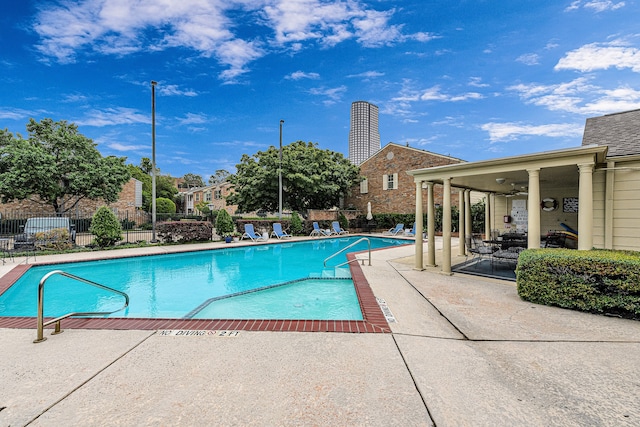 1329 Fountain View Dr Unit 135, Houston, TX 77057 - view of swimming pool featuring a patio