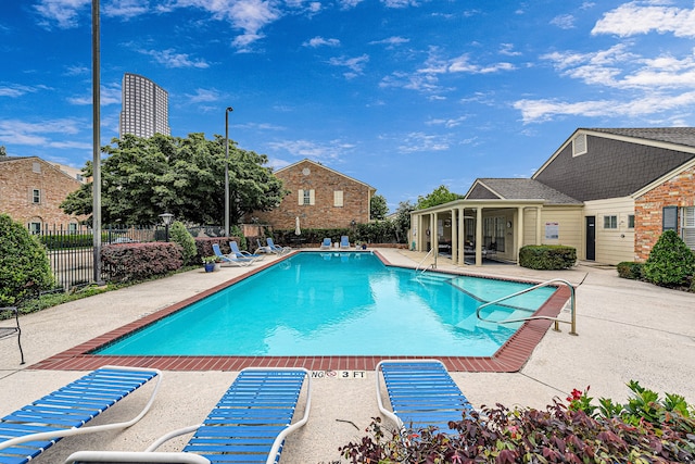 1329 Fountain View Dr Unit 135, Houston, TX 77057 - view of pool featuring a patio