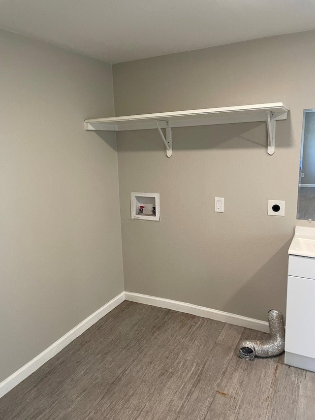 laundry room featuring hookup for a washing machine, hardwood / wood-style floors, and electric dryer hookup