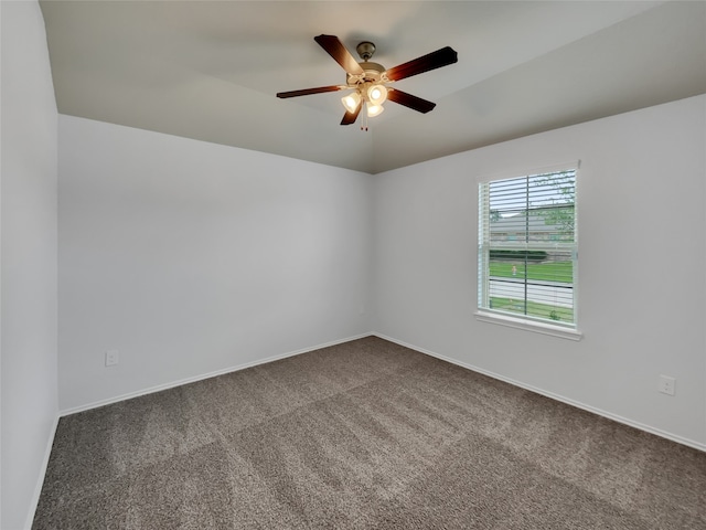 unfurnished room featuring carpet and ceiling fan