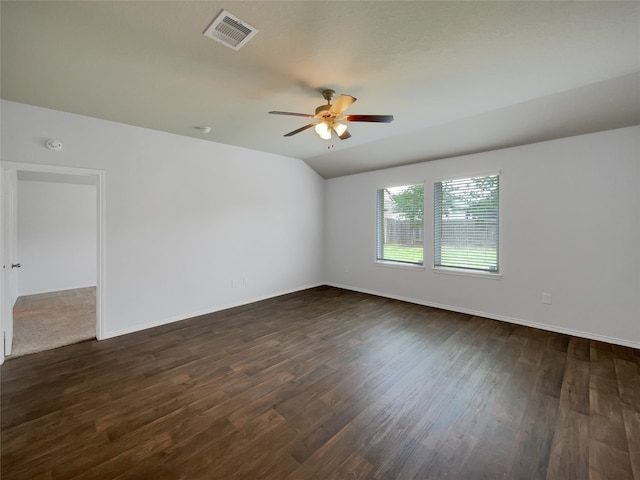 spare room with ceiling fan and dark wood-type flooring