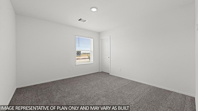 spare room with carpet flooring