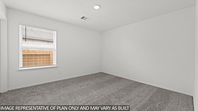 unfurnished room with carpet flooring