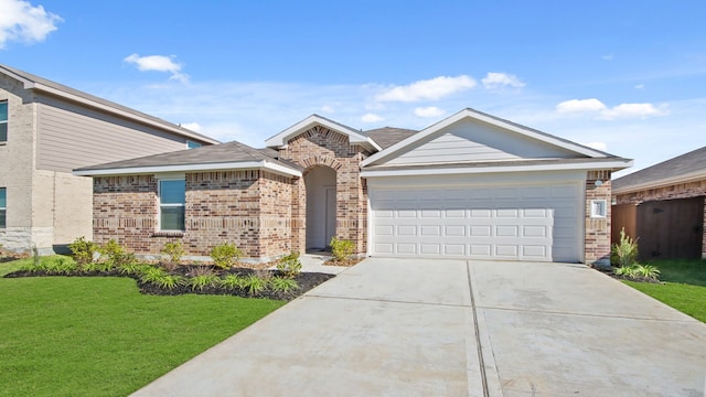 ranch-style home with a front lawn and a garage