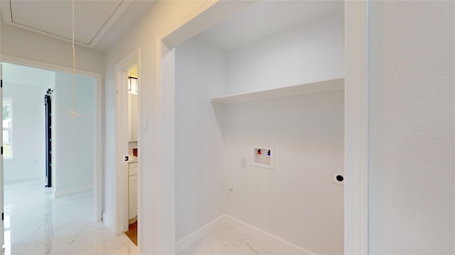 washroom featuring tile flooring and hookup for a washing machine