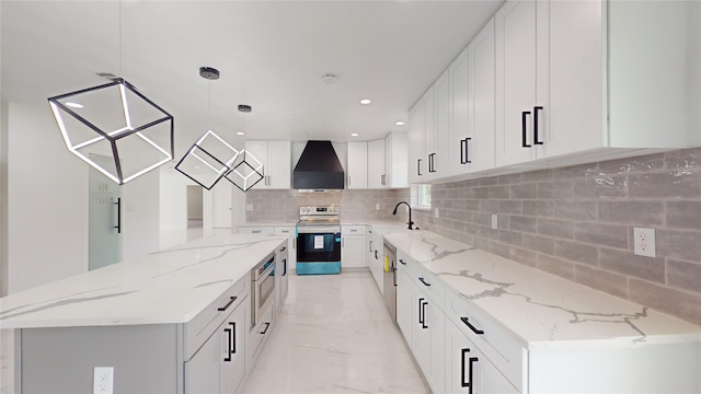 kitchen featuring light tile flooring, backsplash, range with electric cooktop, white cabinetry, and premium range hood