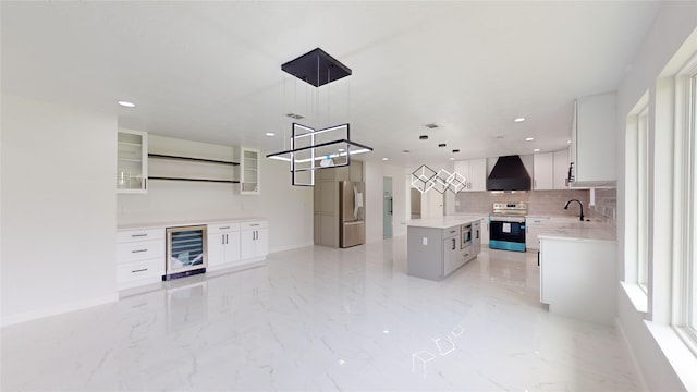 kitchen with stainless steel fridge with ice dispenser, white cabinets, premium range hood, electric range oven, and wine cooler