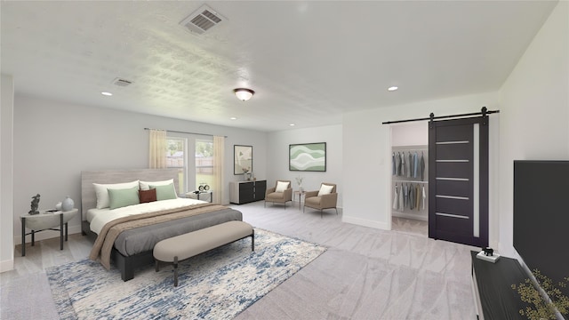 bedroom with light carpet and a barn door