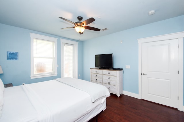 bedroom featuring dark wood-type flooring and ceiling fan