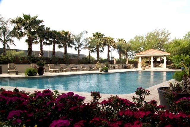 view of swimming pool featuring a patio area and a gazebo