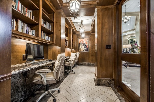 tiled office featuring a notable chandelier, ornamental molding, wooden walls, and built in features