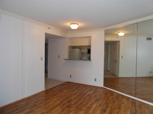 interior space featuring crown molding