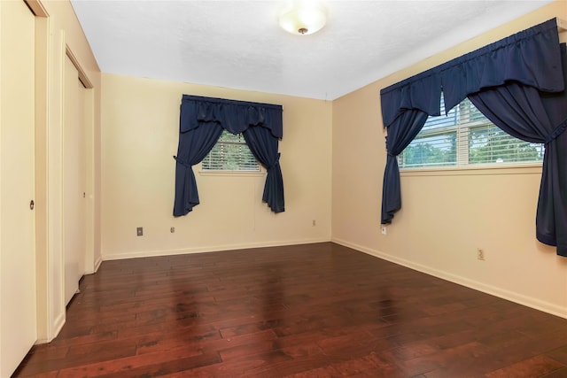 bedroom featuring dark wood-type flooring