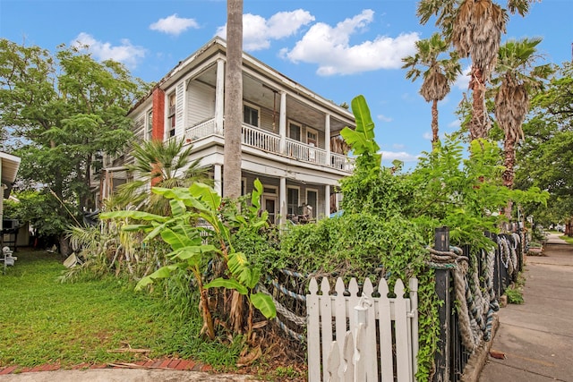 view of property exterior with a balcony