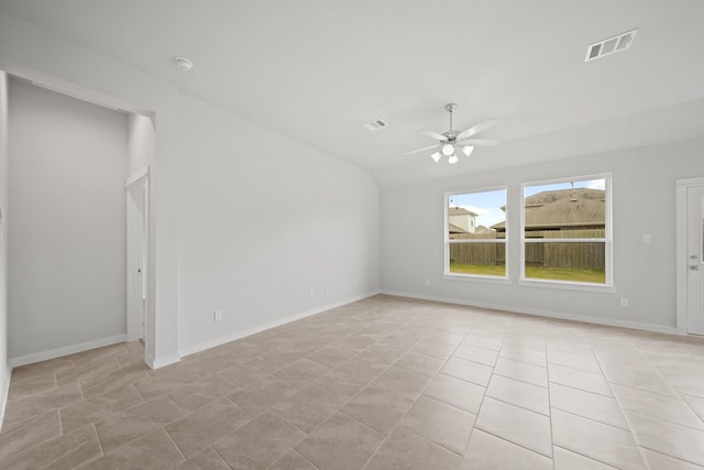 tiled empty room with ceiling fan