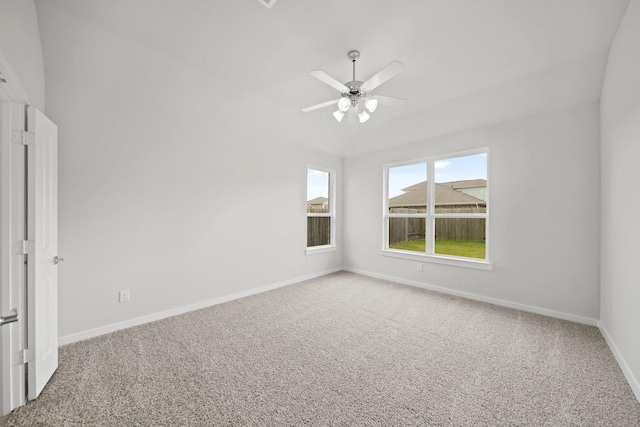 unfurnished room with carpet flooring and ceiling fan