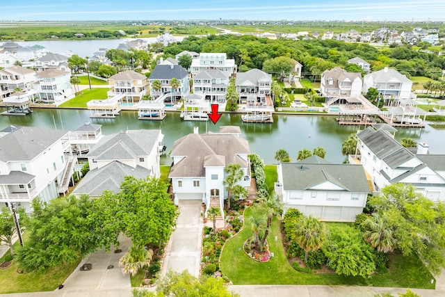 bird's eye view with a water view