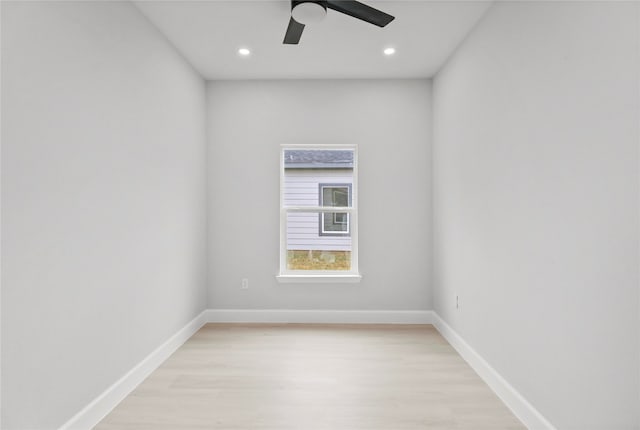 unfurnished room featuring ceiling fan and light wood-type flooring