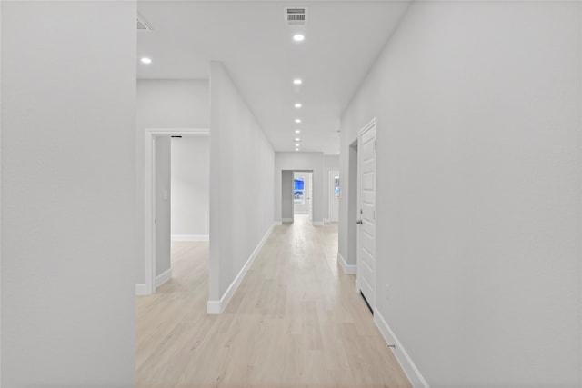 hall featuring light hardwood / wood-style floors