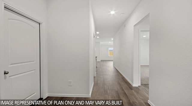 hall with dark hardwood / wood-style floors