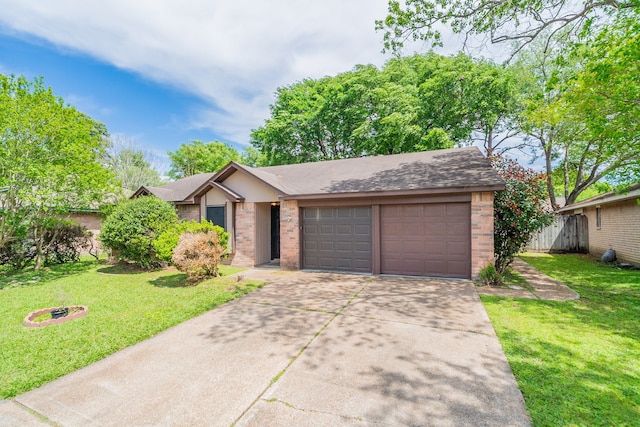 ranch-style home with a garage and a front yard