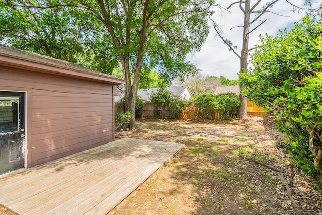 view of yard featuring a wooden deck