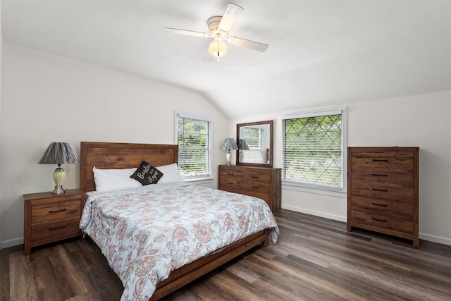 bedroom with dark hardwood / wood-style floors, ceiling fan, and lofted ceiling