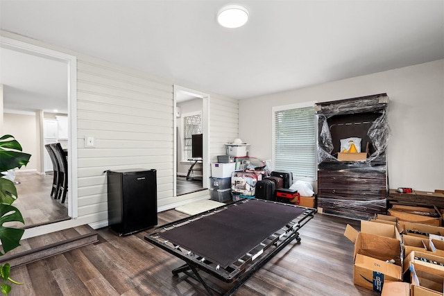 workout area featuring dark hardwood / wood-style floors