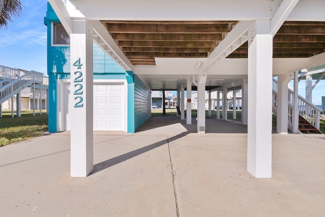 view of terrace featuring a carport