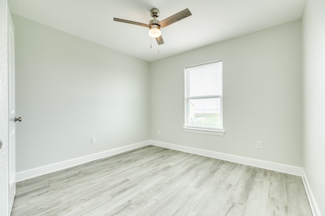 unfurnished room with light hardwood / wood-style flooring and ceiling fan