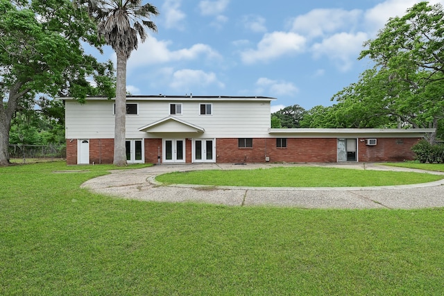 view of front of house with a front lawn