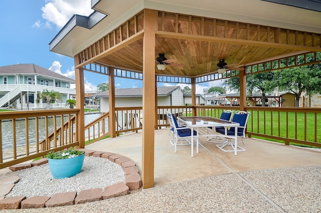 view of patio / terrace featuring ceiling fan