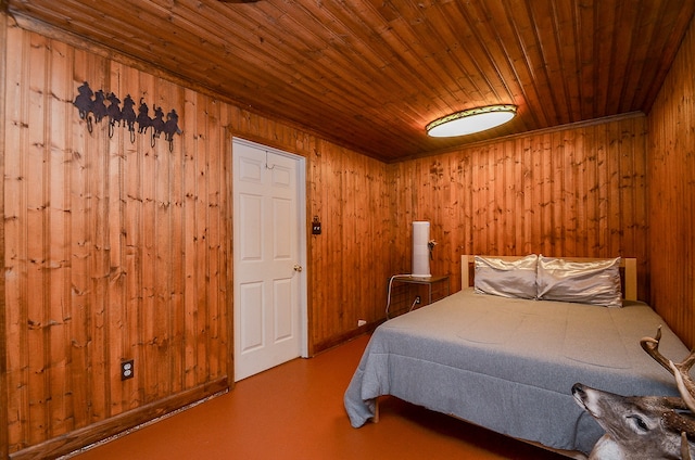 bedroom featuring wooden ceiling and wood walls