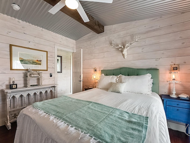 bedroom with hardwood / wood-style flooring, ceiling fan, vaulted ceiling with beams, wooden walls, and wooden ceiling