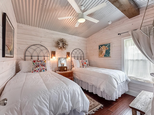 bedroom with dark hardwood / wood-style floors, wooden walls, lofted ceiling with beams, and wooden ceiling