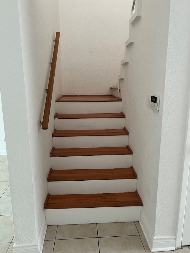 stairs with tile floors