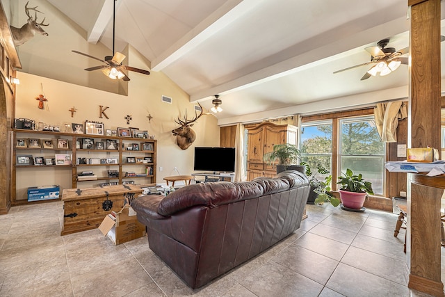 tiled living room with ceiling fan and vaulted ceiling with beams