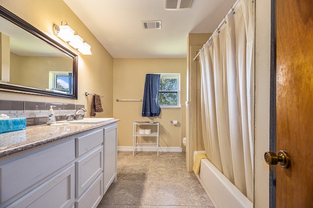 full bathroom featuring shower / tub combo, toilet, tasteful backsplash, tile patterned floors, and vanity