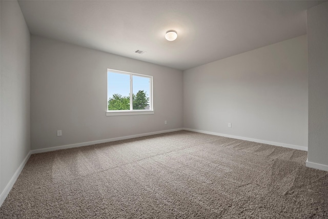 spare room with carpet floors