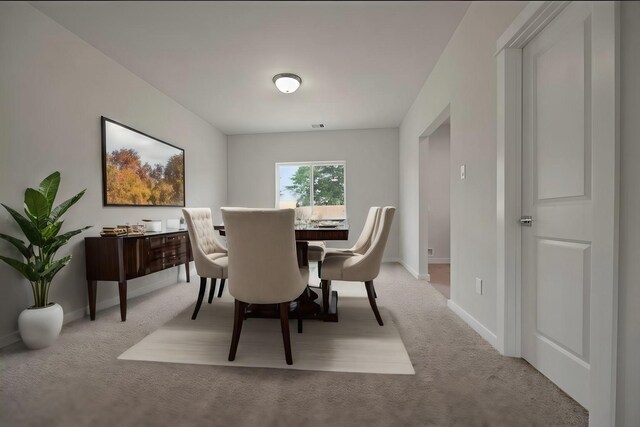 view of carpeted dining room