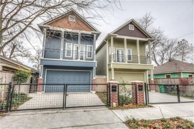 view of front of home with a garage and a balcony