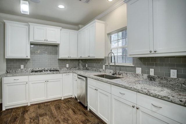 kitchen with ornamental molding, dark hardwood / wood-style flooring, backsplash, and sink