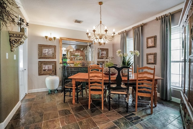 dining space featuring crown molding and a notable chandelier