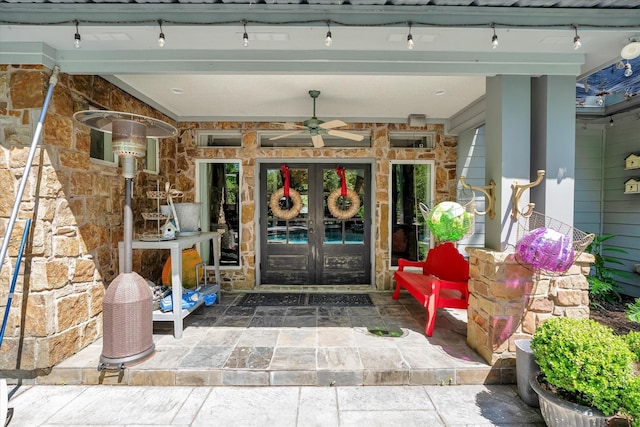 doorway to property with ceiling fan, a patio, and french doors