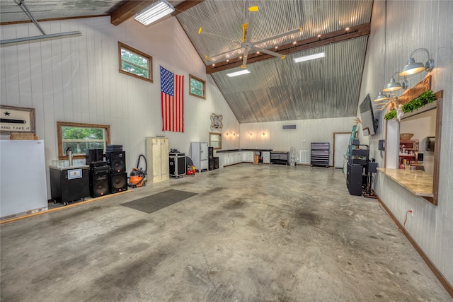 garage featuring wooden walls