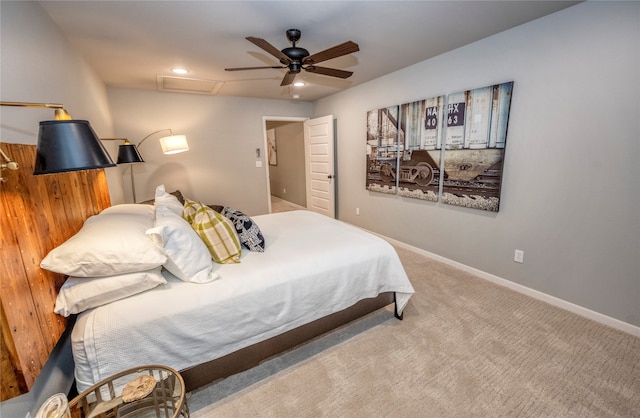 bedroom with ceiling fan and light colored carpet