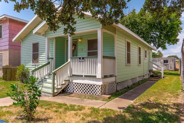 bungalow-style home with a porch