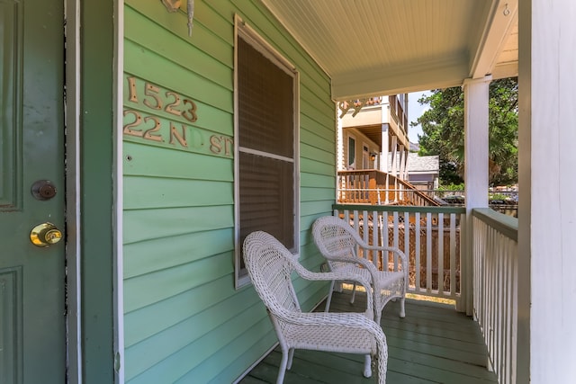 balcony featuring a porch