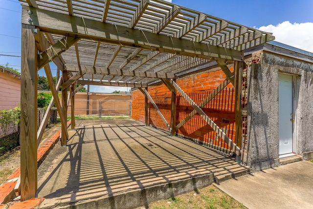 view of patio featuring a pergola